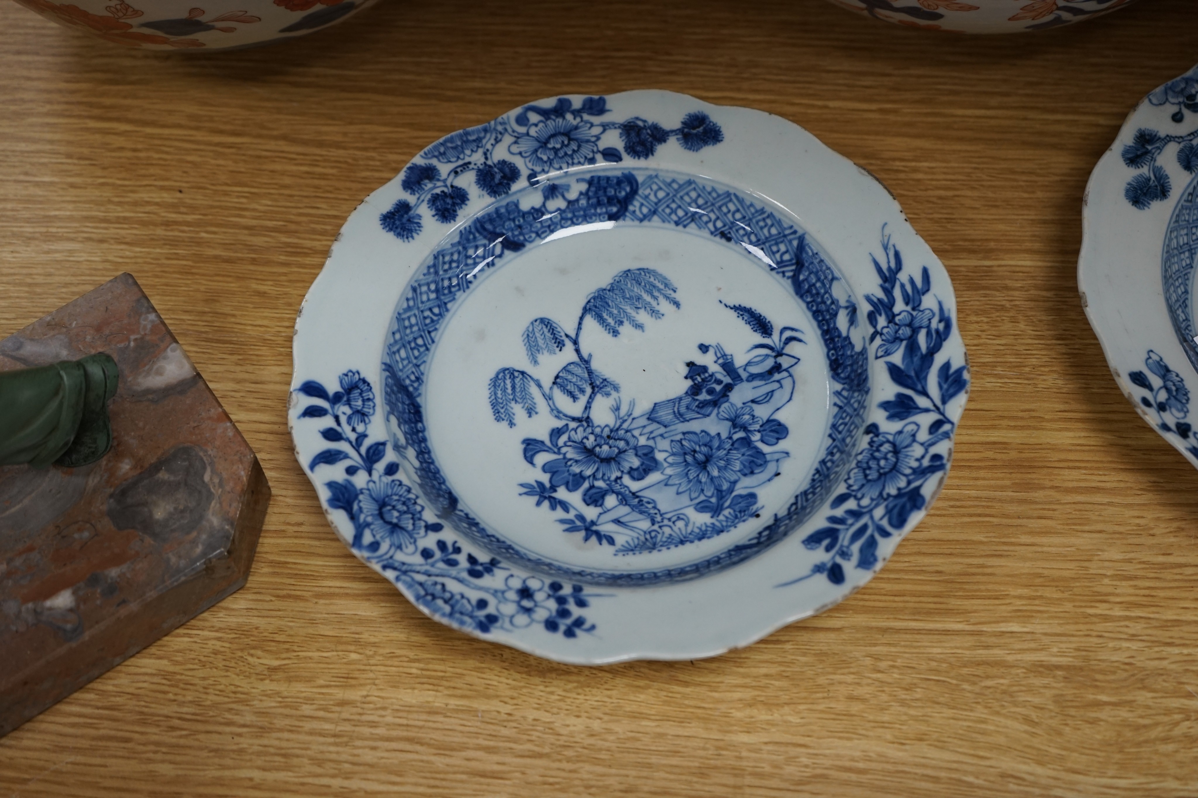 Three 18th century Chinese export porcelain bowls, largest 28 cm and two plates